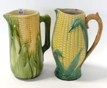 TWO MAJOLICA POTTERY "CORN" PITCHERS