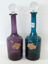 PAIR OF COLOURED GLASS DECANTERS