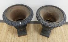 PAIR OF CAST IRON GARDEN URNS