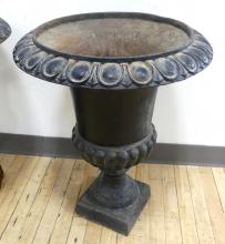 PAIR OF CAST IRON GARDEN URNS