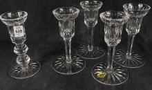 FIVE WATERFORD CANDLESTICKS