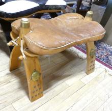 TWO CAMEL SADDLE FOOTSTOOLS