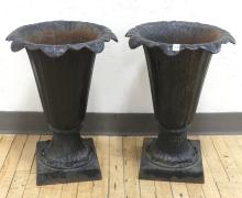 PAIR OF CAST IRON GARDEN URNS