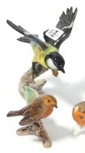 FIVE "BIRD" FIGURINES