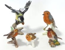 FIVE "BIRD" FIGURINES