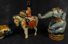 FOUR VINTAGE TIN TOYS