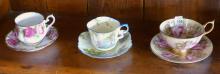 SIX ENGLISH CUPS AND SAUCERS