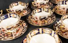 TWELVE DERBY "IMARI" BOUILLON CUPS AND SAUCERS