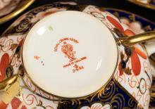 TWELVE DERBY "IMARI" BOUILLON CUPS AND SAUCERS