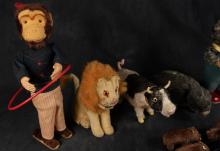 EIGHT VINTAGE WIND-UP TOYS