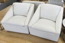 PAIR OF DELPHINE SWIVEL CHAIRS