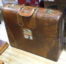 TWO VINTAGE LEATHER SUITCASES