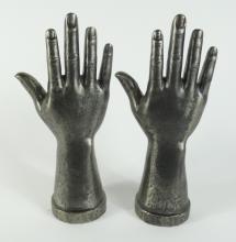 PAIR OF CAST IRON "HAND" SCULPTURES