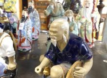 ELEVEN CHINESE FIGURINES