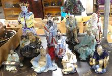 ELEVEN CHINESE FIGURINES