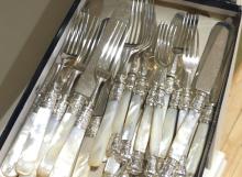 TWO MOTHER-OF-PEARL HANDLED LUNCHEON SETS