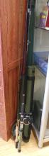 THREE FISHING RODS AND CASES