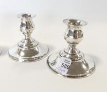 TWO PAIRS OF STERLING CANDLEHOLDERS