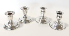 TWO PAIRS OF STERLING CANDLEHOLDERS