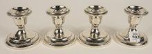 SET OF FOUR STERLING CANDLEHOLDERS