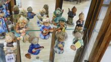 NINE HUMMEL FIGURINES