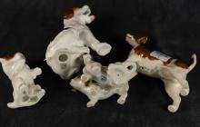 FOUR "DOG" FIGURINES