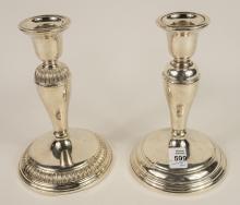 TWO BIRKS STERLING CANDLESTICKS`