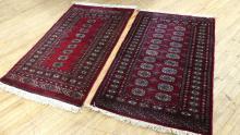 THREE BOKHARA RUGS