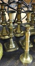 FIVE PAIRS OF BRASS CANDLESTICKS