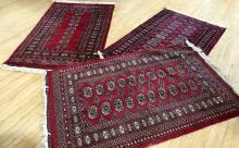 THREE BOKHARA RUGS