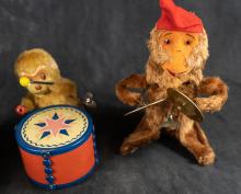 FOUR VINTAGE WIND-UP TOYS