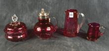 FOUR PIECES OF ANTIQUE CRANBERRY GLASS