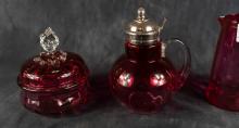 FOUR PIECES OF ANTIQUE CRANBERRY GLASS