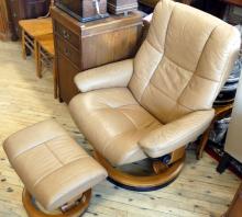 STRESSLESS LEATHER RECLINER AND FOOTSTOOL