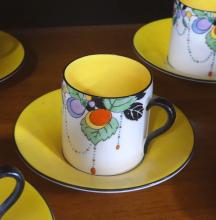 FIVE SHELLEY DEMITASSE CUPS AND SAUCERS