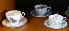 SIX ENGLISH CUPS AND SAUCERS