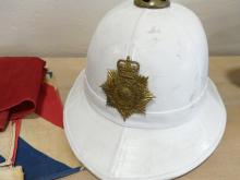 TWO HELMETS AND TWO FLAGS