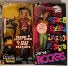 4 BARBIES IN BOXES