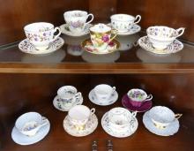 TWELVE CUPS AND SAUCERS