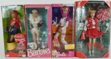 4 BARBIES IN BOXES