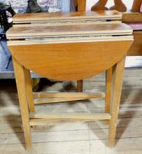 PAIR OF FOLDING TEAK TABLES