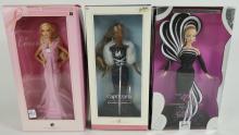 3 BARBIES IN BOXES