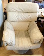 LEATHER ARMCHAIR AND FOOTSTOOL