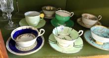 EIGHT ENGLISH CUPS AND SAUCERS