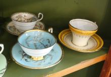 EIGHT ENGLISH CUPS AND SAUCERS