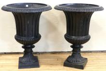 PAIR OF CAST IRON GARDEN URNS