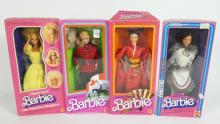 4 BARBIES IN BOXES