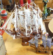 FOUR WOODEN MODEL SHIPS