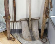 FOUR PRIMITIVE FARM TOOLS