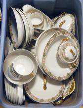 TWO TOTES OF LIMOGES DINNERWARE